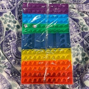 Fidget toy board game with two dice.